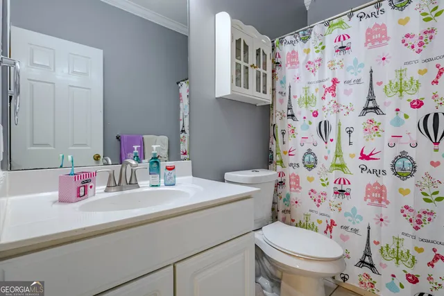 a bedroom with furniture and closet