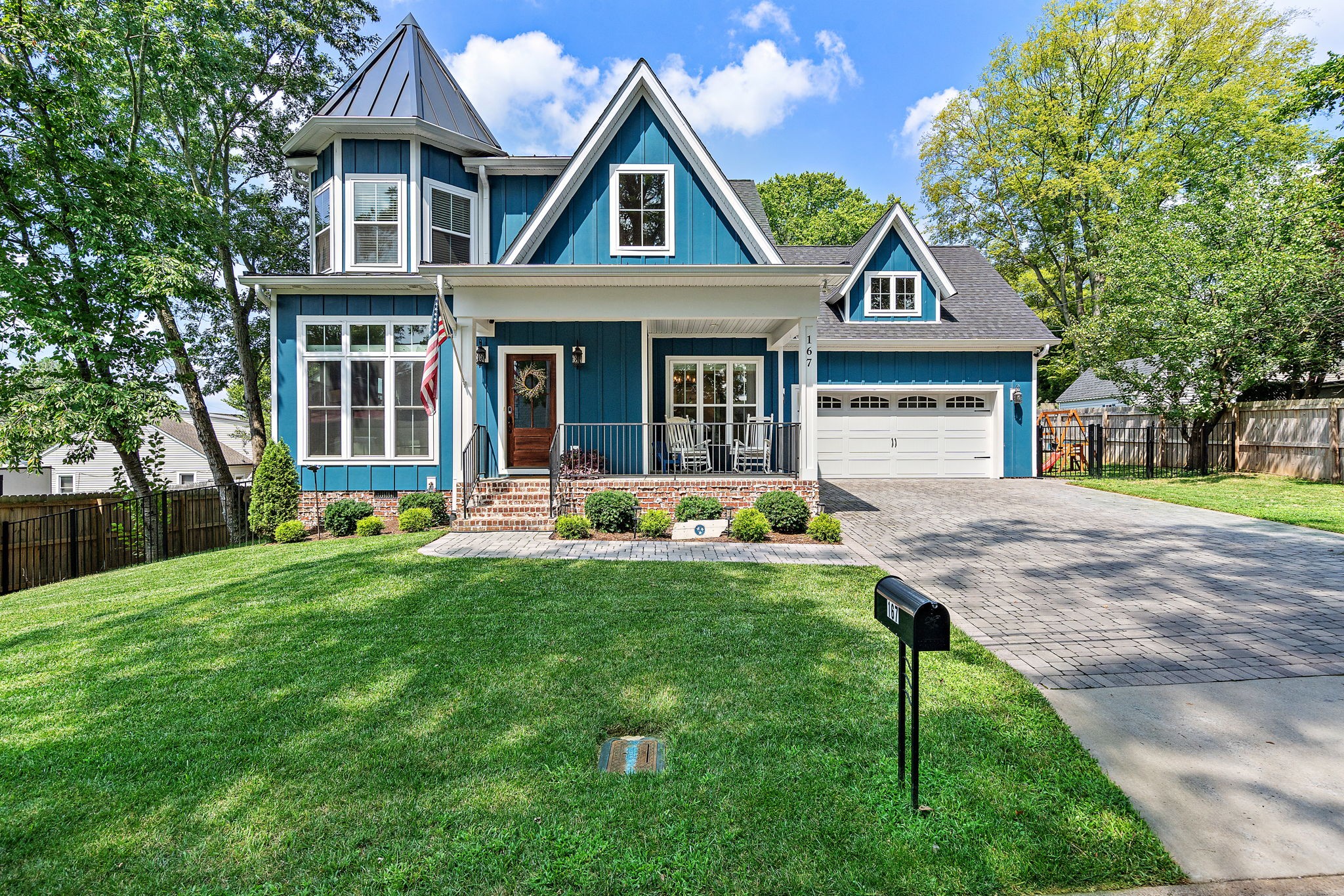 a front view of a house with yard