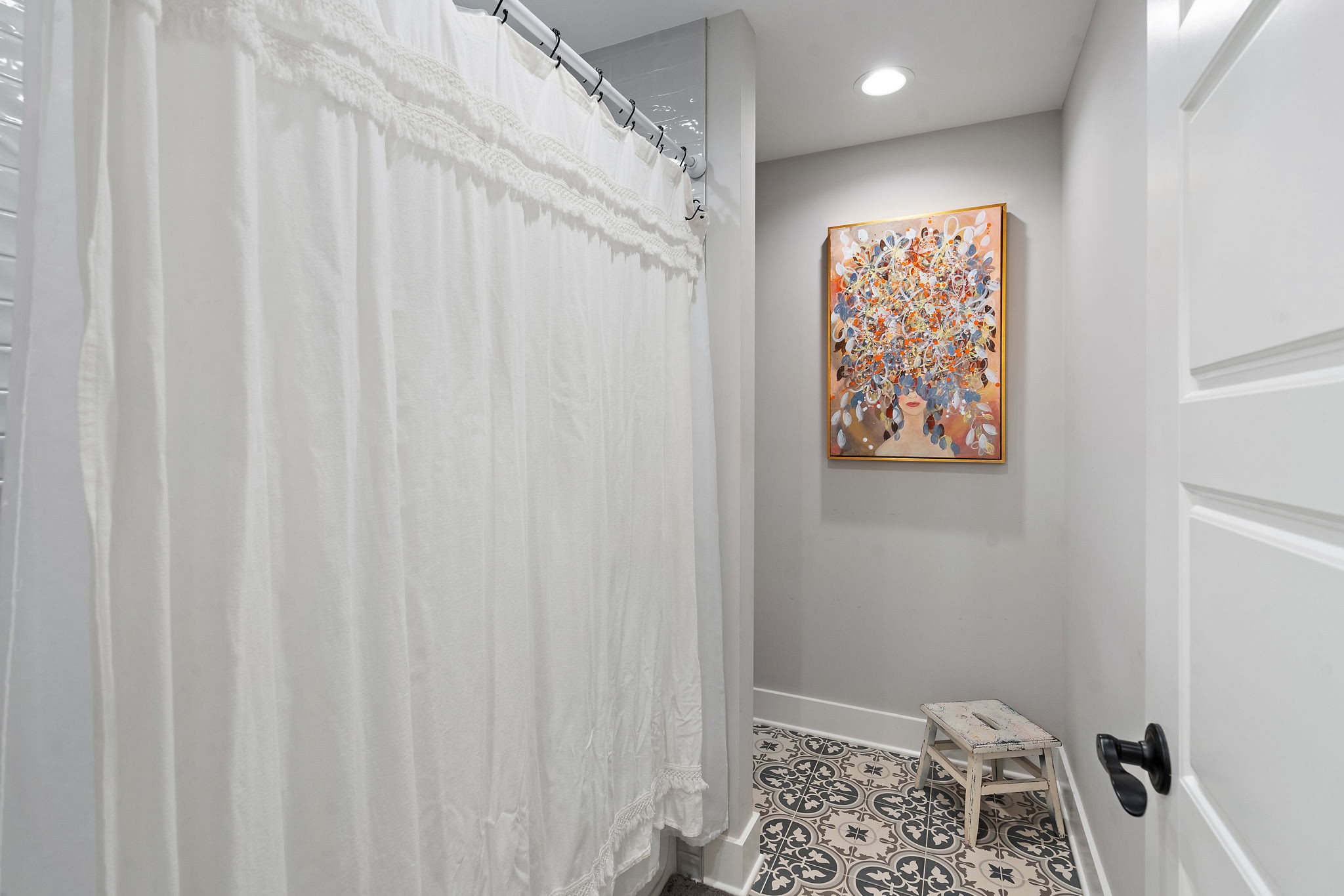 167 South Garner Street Springfield, TN 37172 - Photo 17 of 37 a bathroom with a shower curtain and a window