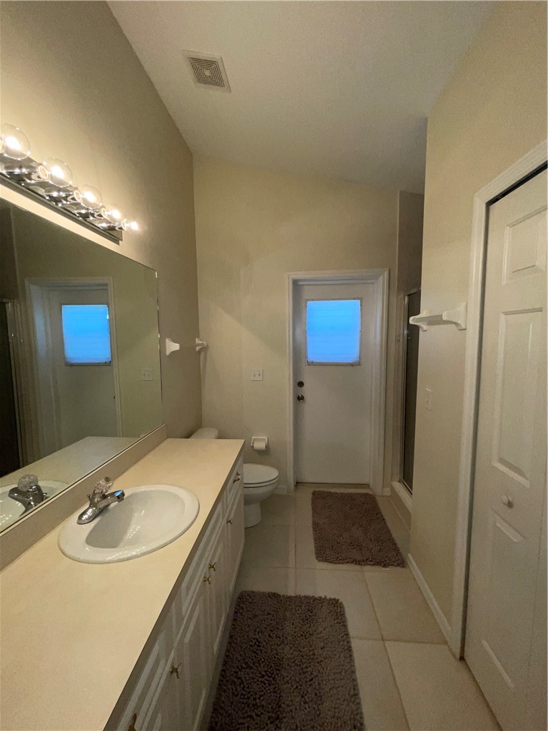 962 Montrose Avenue Sebastian, FL 32958 - Photo 13 of 30 a bathroom with a sink and a mirror