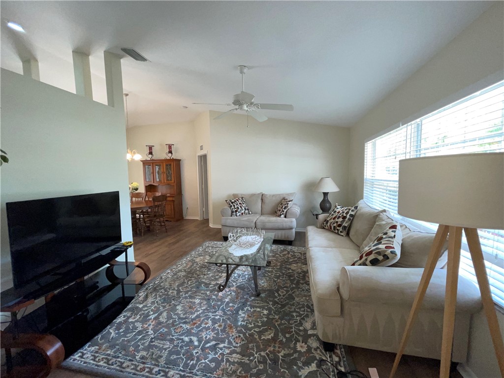 962 Montrose Avenue Sebastian, FL 32958 - Photo 2 of 30 a living room with furniture and a flat screen tv