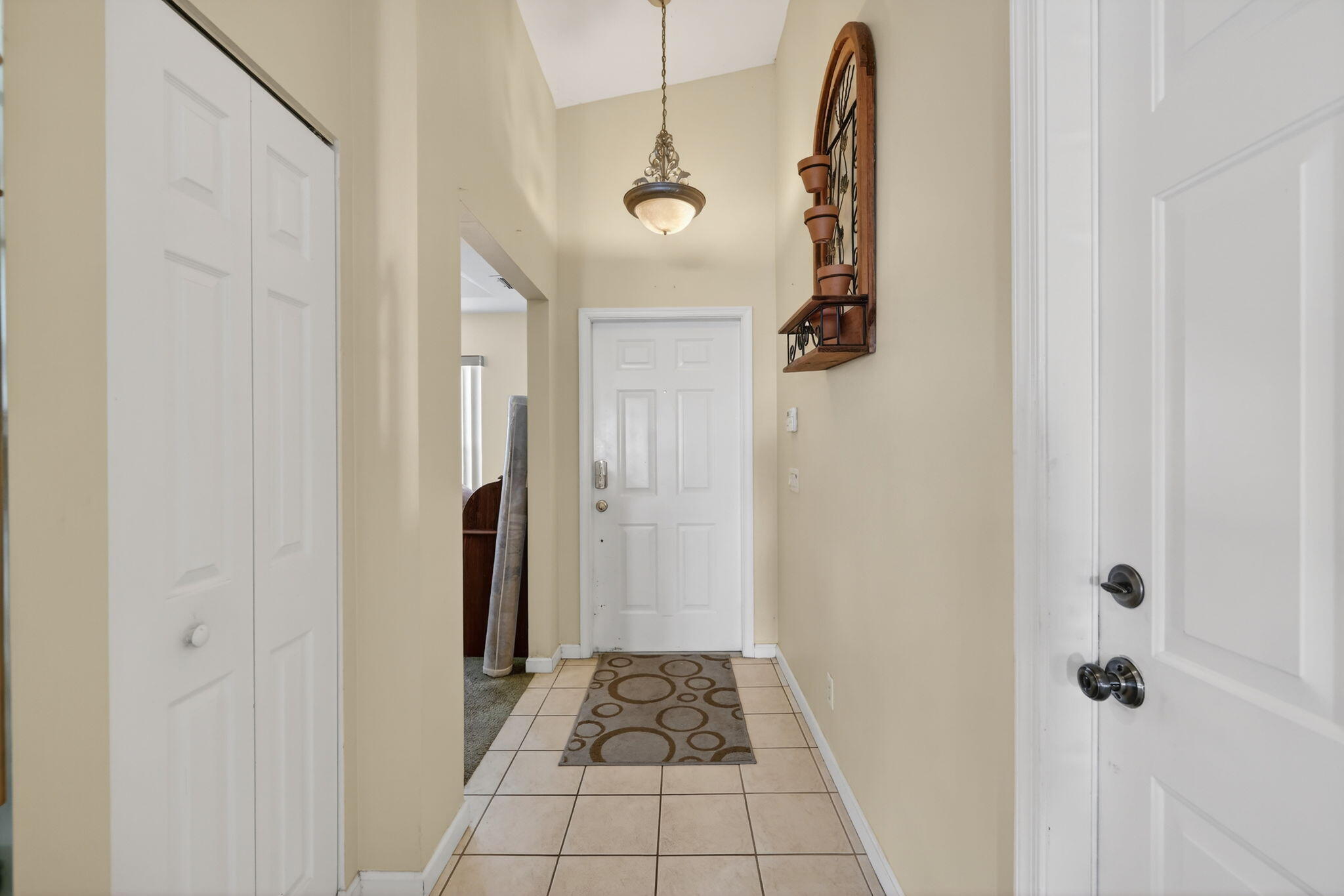 9042 Southwest Caprice Circle Stuart, FL 34997 - Photo 2 of 13 9042-02 - Inside Front Door