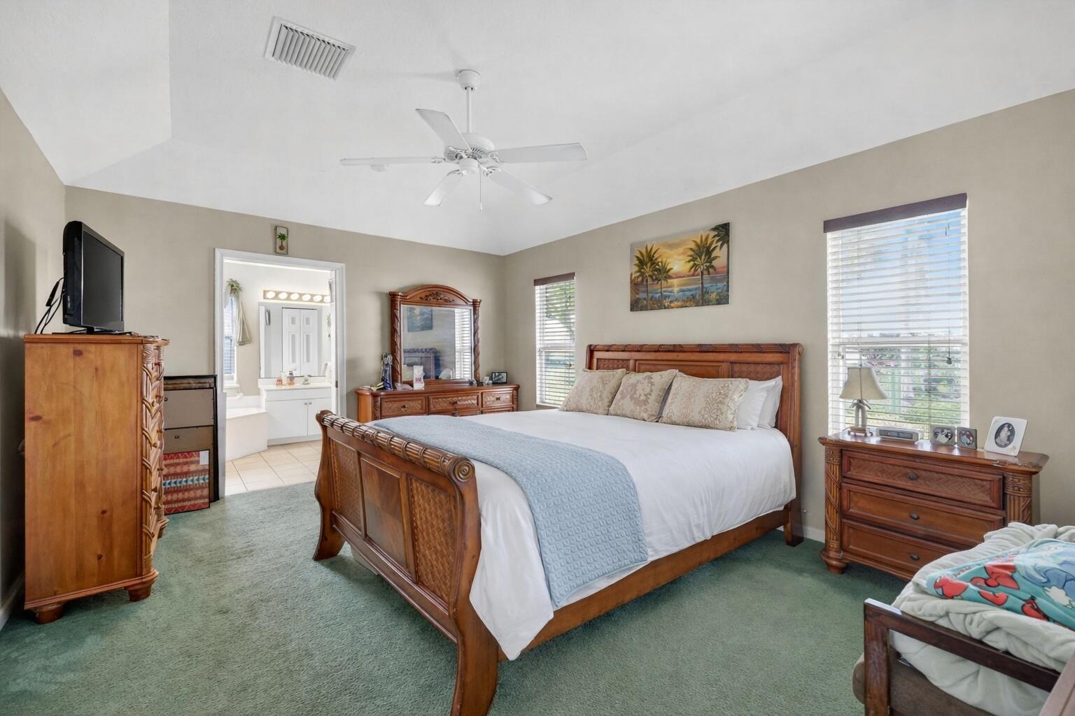 9042 Southwest Caprice Circle Stuart, FL 34997 - Photo 6 of 13 9042-05 Primary Bedroom