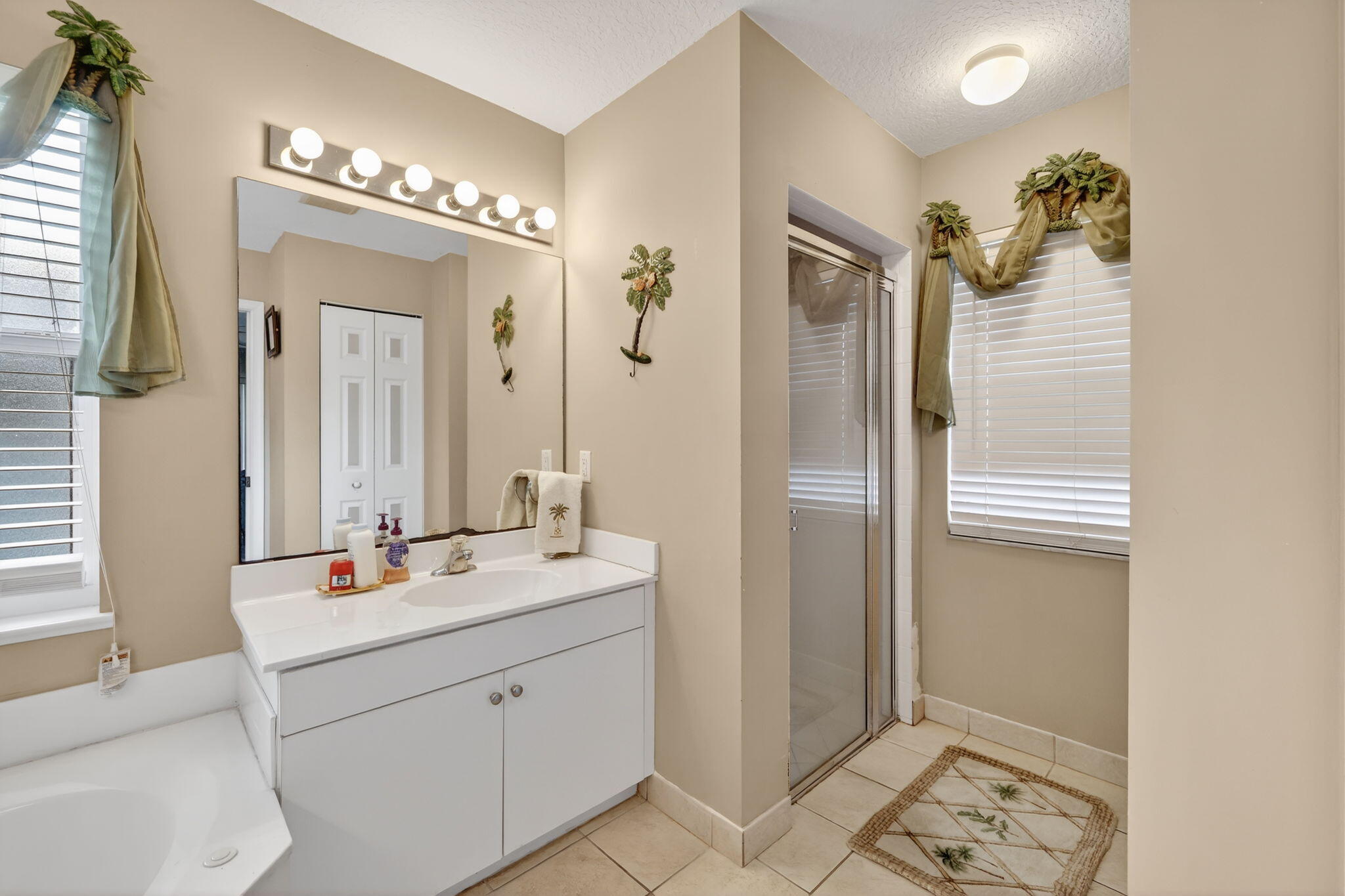 9042 Southwest Caprice Circle Stuart, FL 34997 - Photo 8 of 13 9042-07 Primary Bath 2