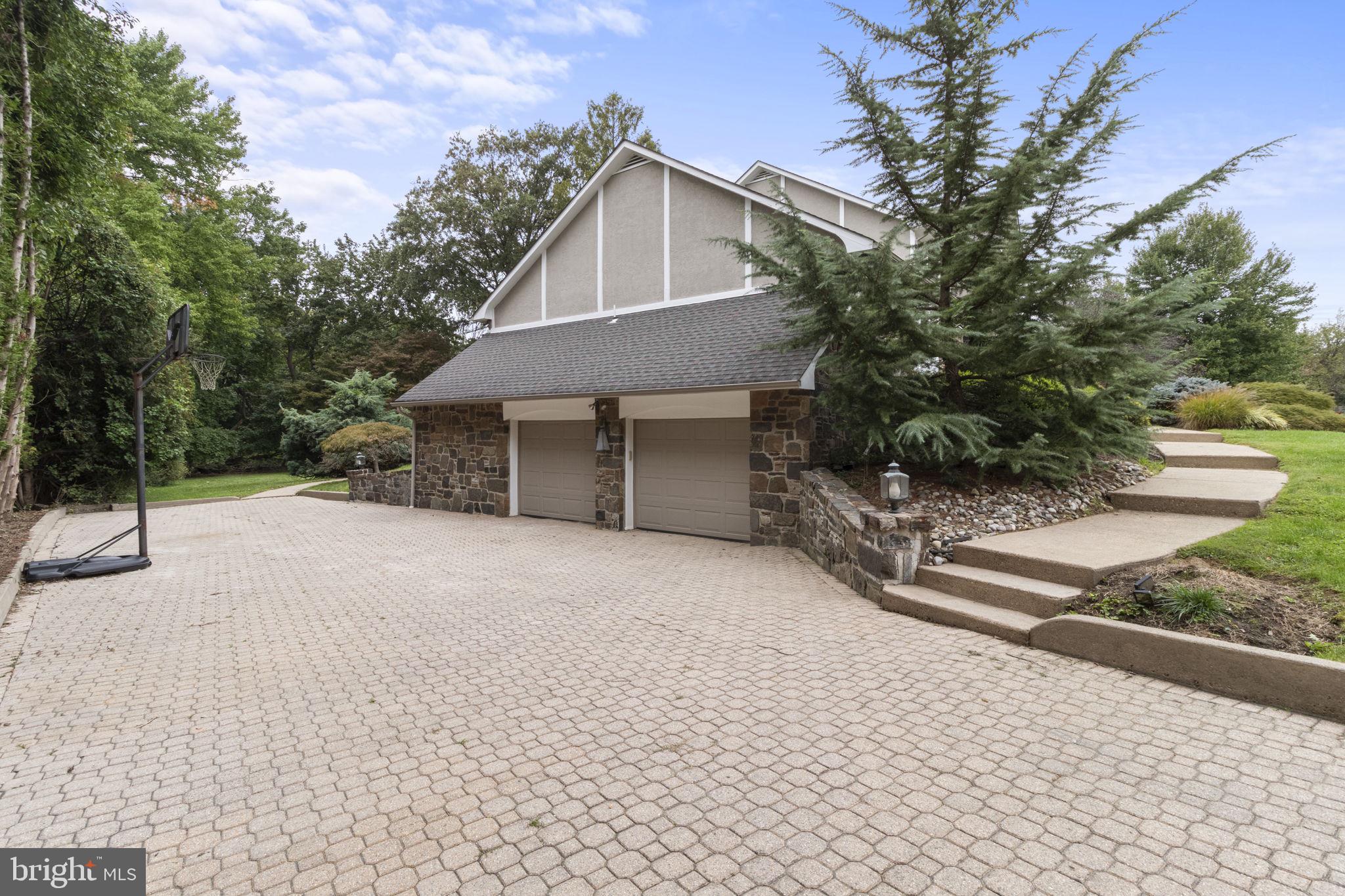 415 Vernon Road Jenkintown, PA 19046 - Photo 7 of 46 2 doors lead to garage long enough to fit 6 cars.
