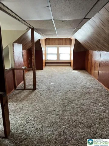 a balcony view with a fireplace