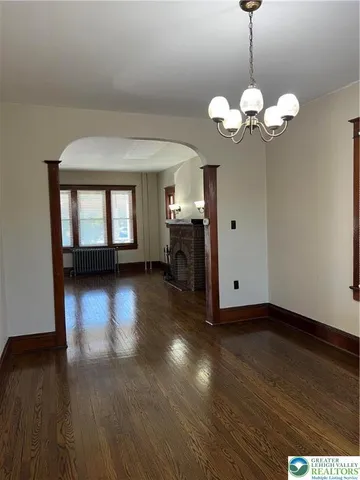 a view of a livingroom with wooden floor