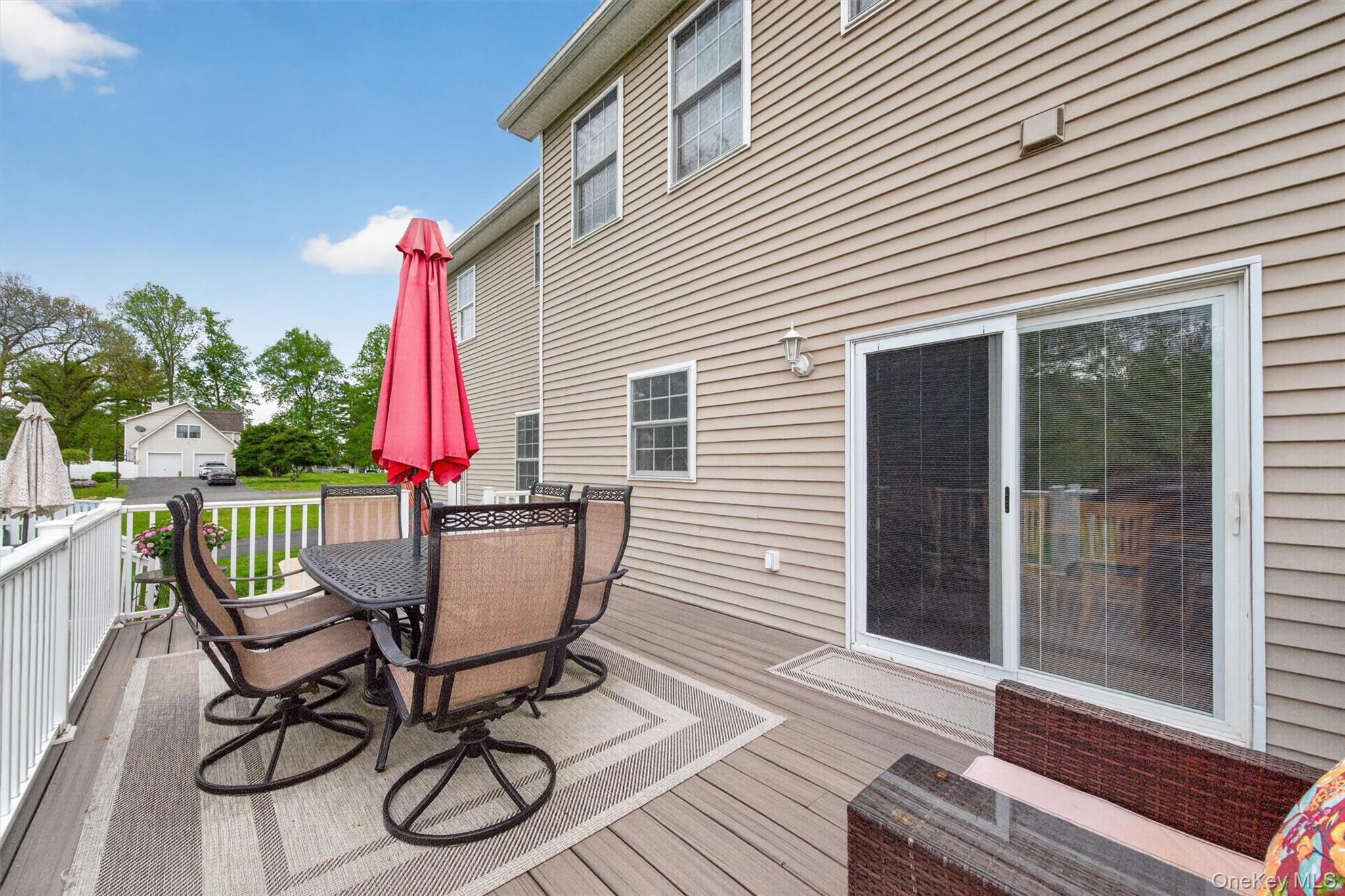 19 Pirog Road Pine Bush, NY 12566 - Photo 41 of 50 a view of a patio with a table and chairs