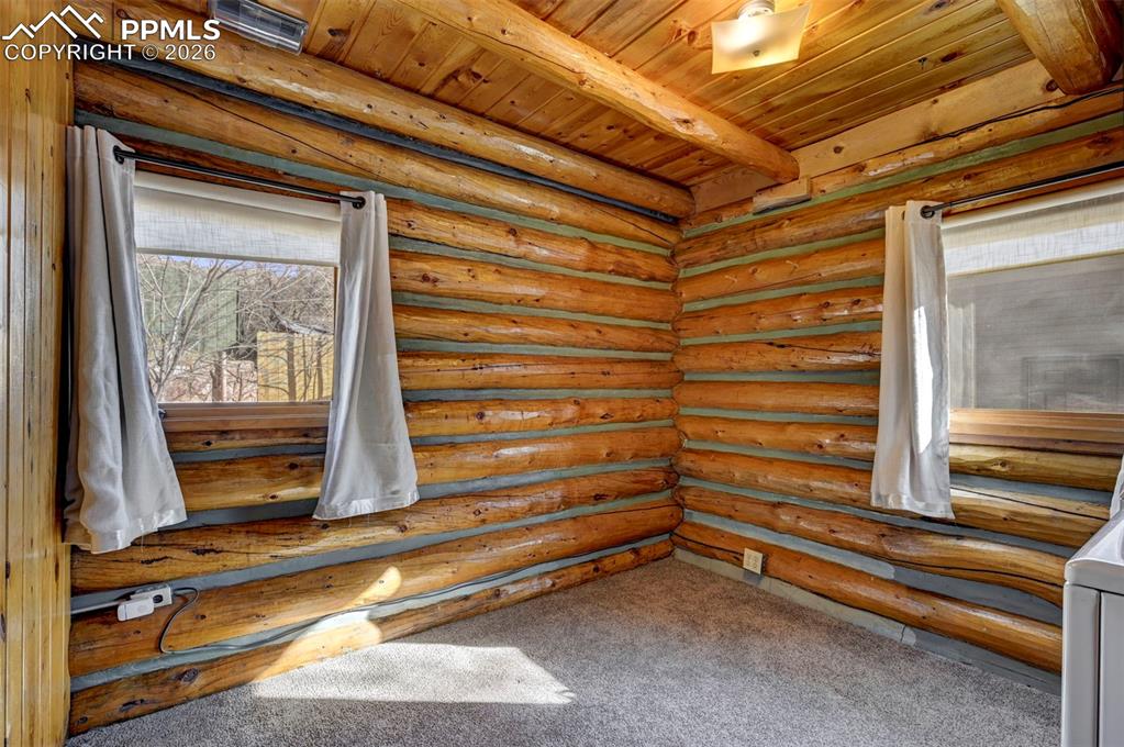 7915 Topeka Avenue Cascade, CO 80809 - Photo 23 of 36 a view of room with a door