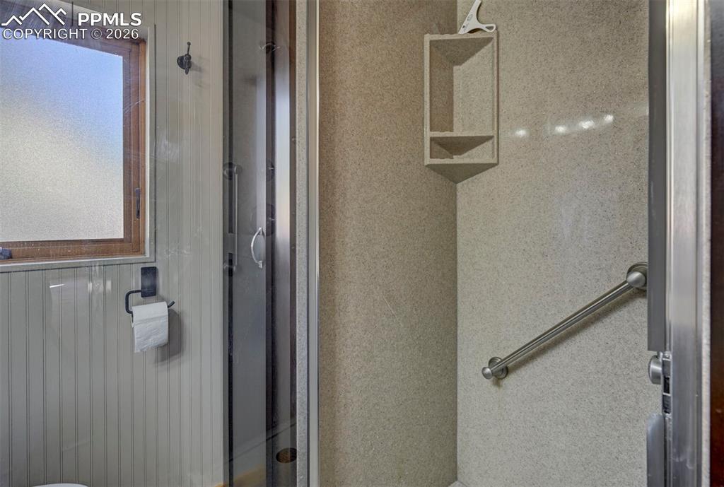 7915 Topeka Avenue Cascade, CO 80809 - Photo 27 of 36 a bathroom with a shower