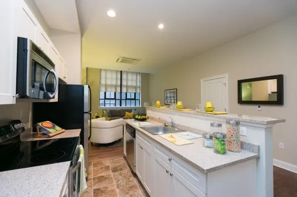 a room with a table and chairs