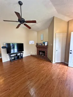 a bedroom with a bed and a mirror