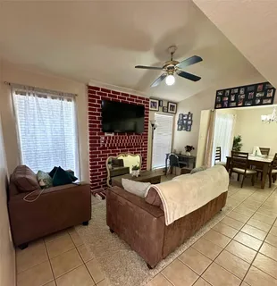 a bathroom with a double vanity sink toilet mirror and shower