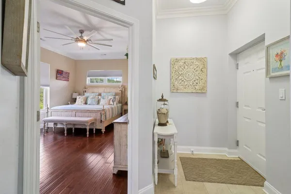 a bedroom with a bed and a table in it