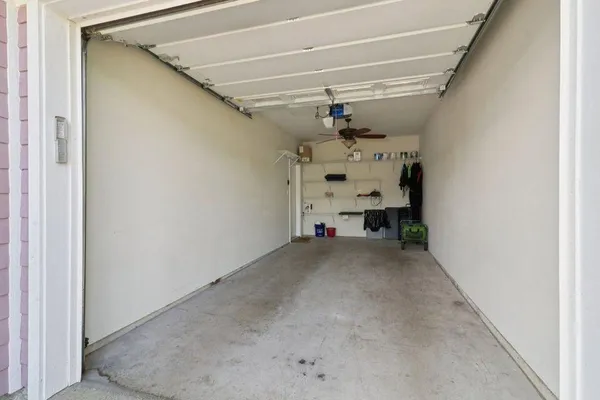 a view of building with river in front of it