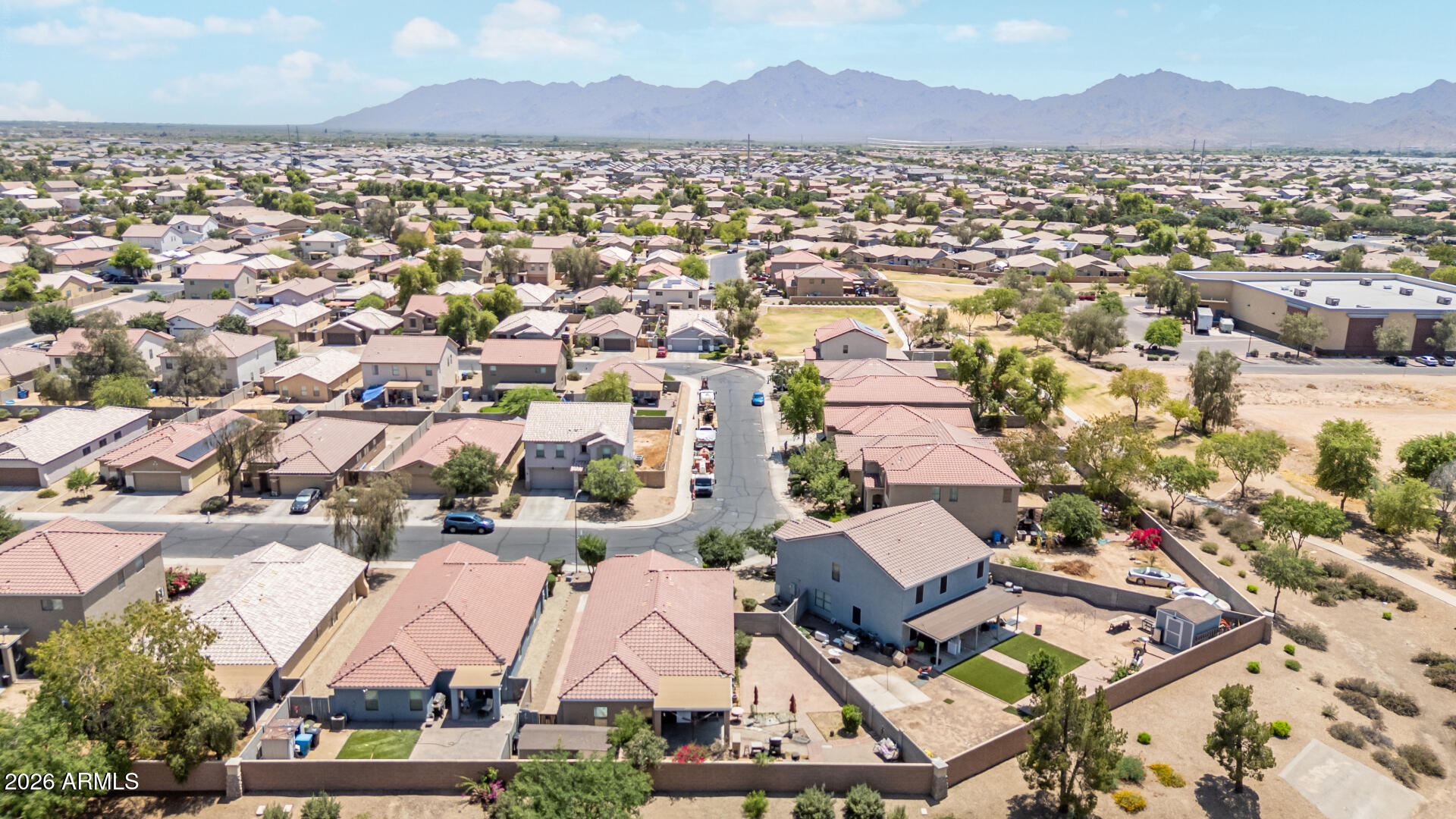 9730 West Payson Road Tolleson, AZ 85353 - Photo 43 of 57 an aerial view of residential houses with outdoor space