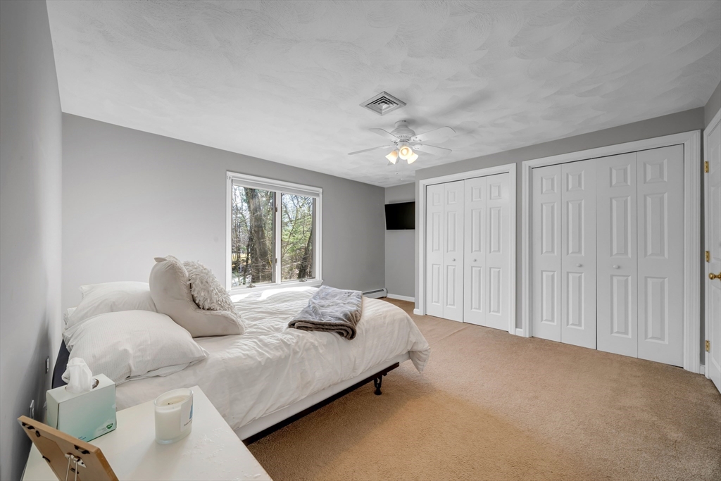 315 Candlestick Road North Andover, MA 01845 - Photo 33 of 42 a bedroom with a bed and window