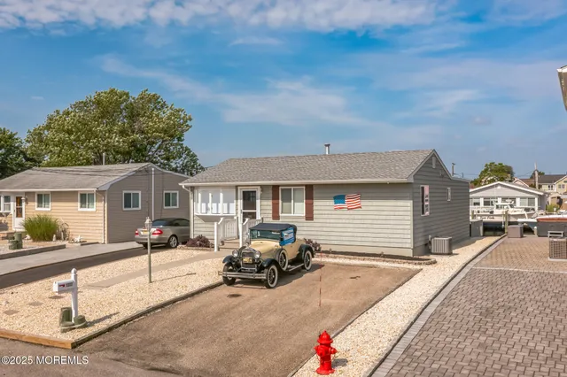 a front view of a house with a patio