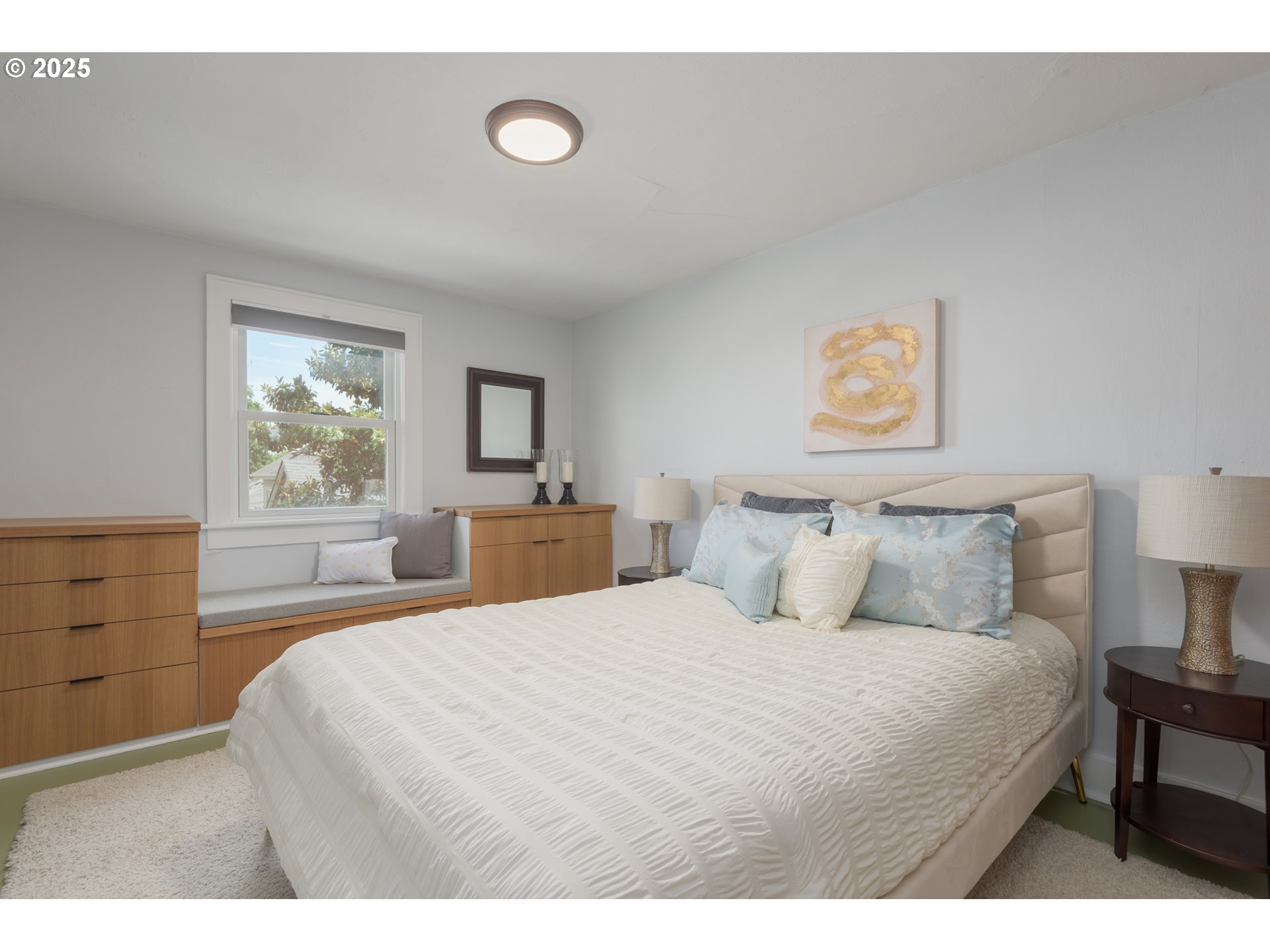 1681 Olive Street Eugene, OR 97401 - Photo 20 of 30 a bedroom with a bed and a table