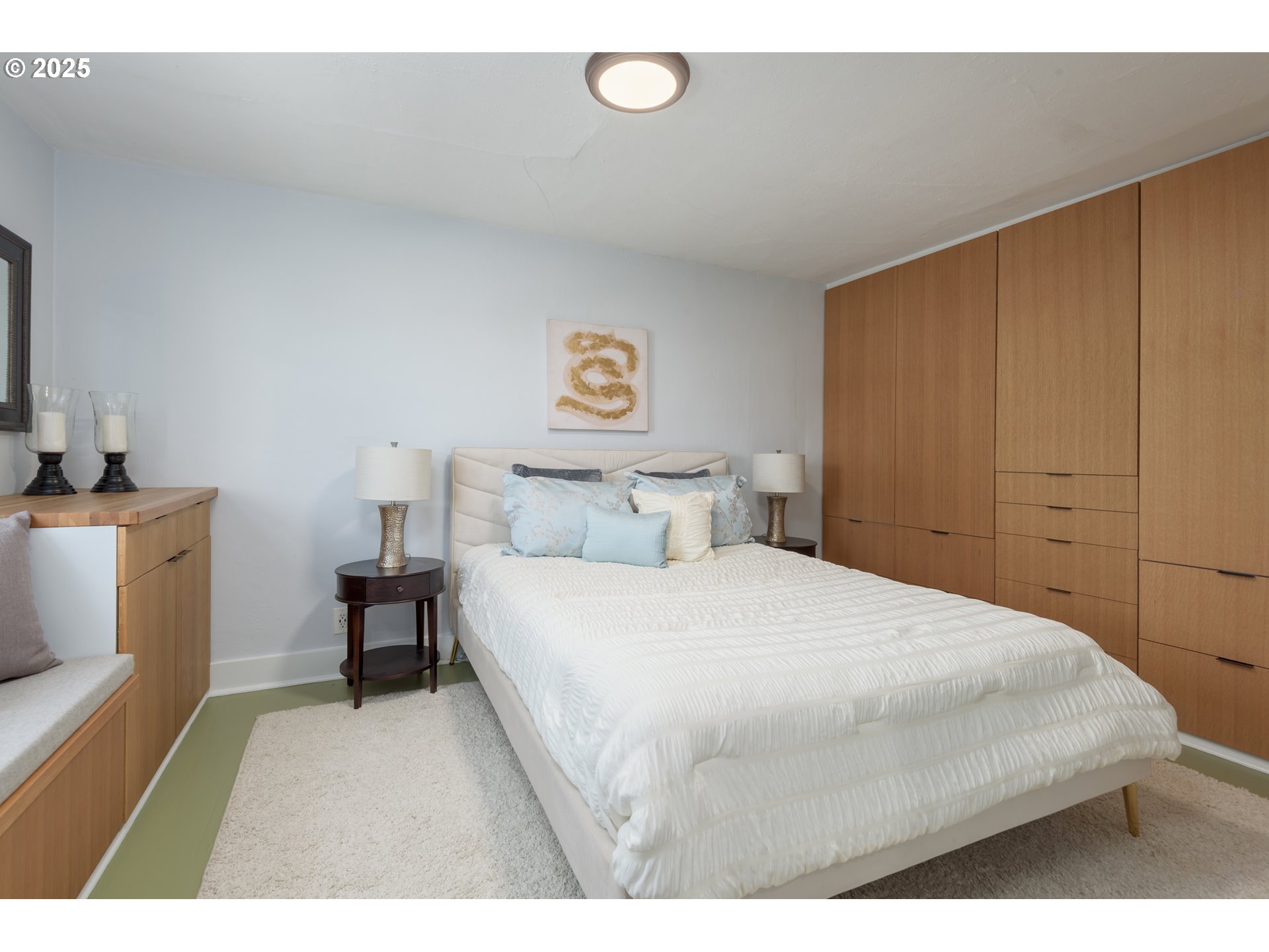 1681 Olive Street Eugene, OR 97401 - Photo 21 of 30 a bedroom with a bed and a table