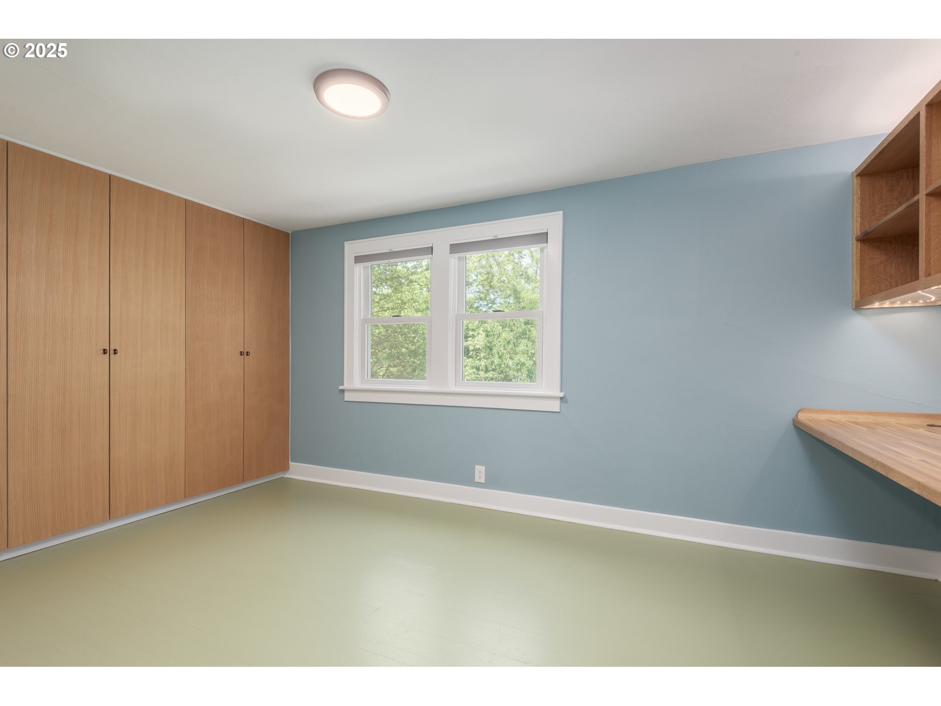 1681 Olive Street Eugene, OR 97401 - Photo 25 of 30 a view of an empty room with a window