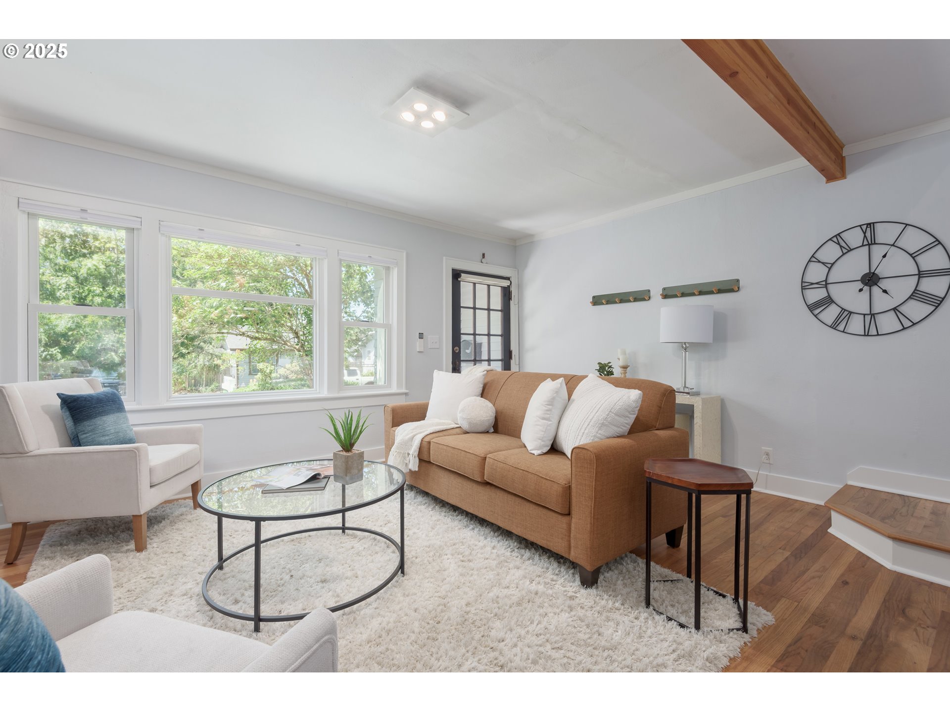 1681 Olive Street Eugene, OR 97401 - Photo 4 of 30 a living room with furniture a table and a large window