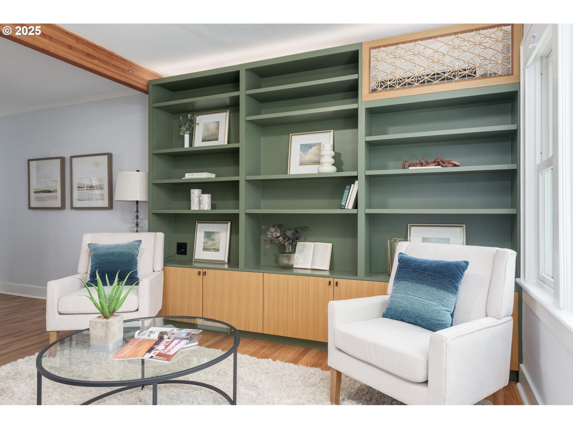 1681 Olive Street Eugene, OR 97401 - Photo 6 of 30 a living room with furniture and a book shelf