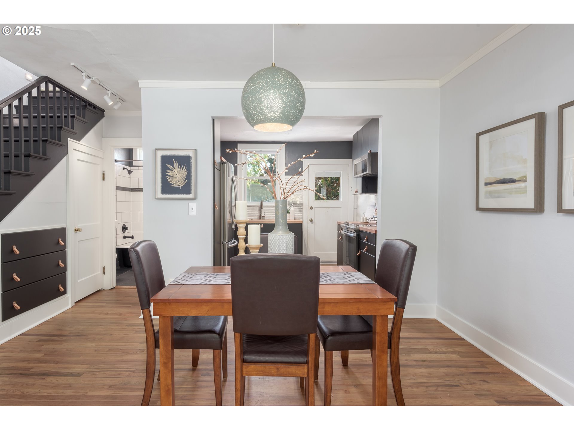 1681 Olive Street Eugene, OR 97401 - Photo 8 of 30 a view of a dining room with furniture and wooden floor