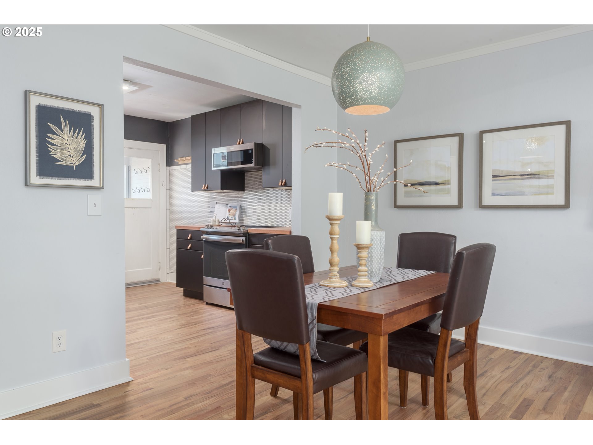 1681 Olive Street Eugene, OR 97401 - Photo 9 of 30 a view of a dining room with furniture and wooden floor