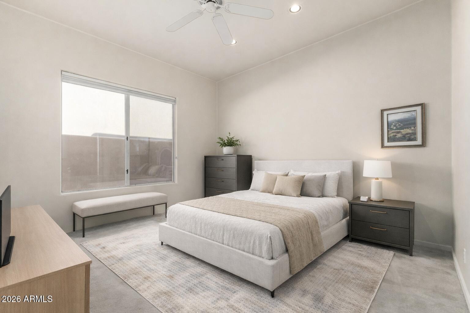 10040 East Happy Valley Road, Unit 2057 Scottsdale, AZ 85255 - Photo 14 of 21 a bedroom with a bed and a large window