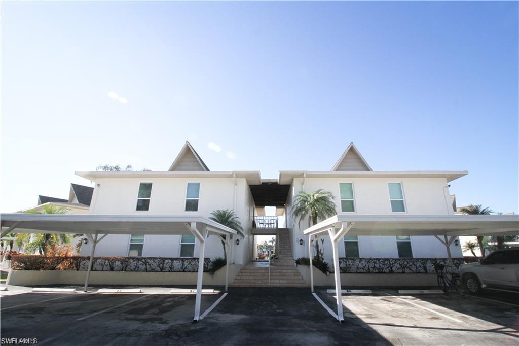 a front view of a house with a porch