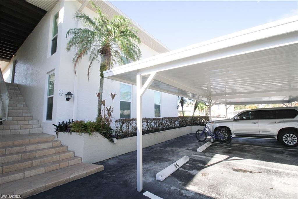 97 Georgetown Boulevard, Unit 97 Naples, FL 34112 - Photo 25 of 25 a view of a car garage
