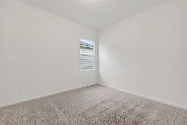 an empty room with a workbench