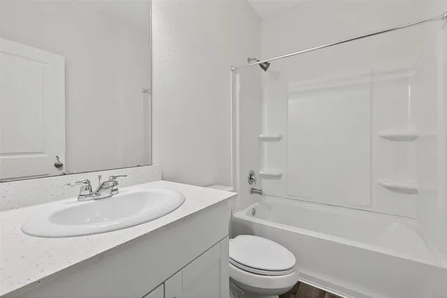a bathroom with a sink and a toilet