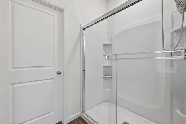 a view of a backyard with seating space