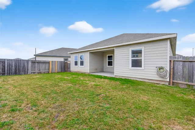 a view of a backyard with a garden