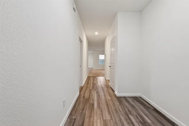 a view of large kitchen with stainless steel appliances kitchen