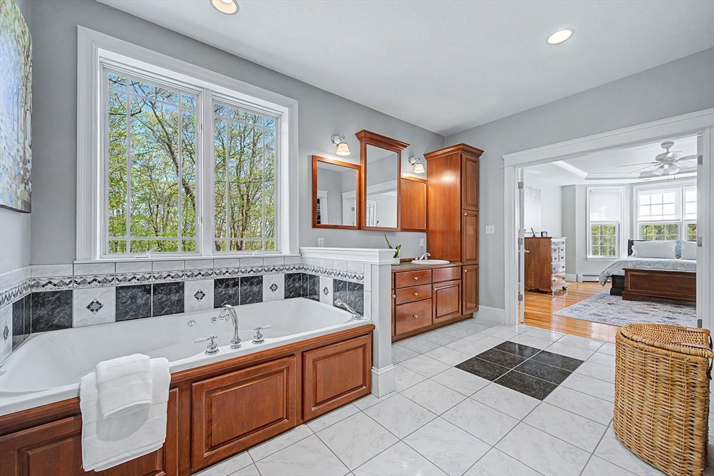 270 Mendon Road Sutton, MA 01590 - Photo 22 of 42 a kitchen with stainless steel appliances granite countertop a sink and a refrigerator