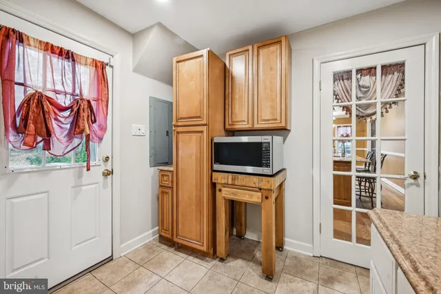a view of cabinets and window