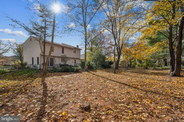 a house with trees in front of it