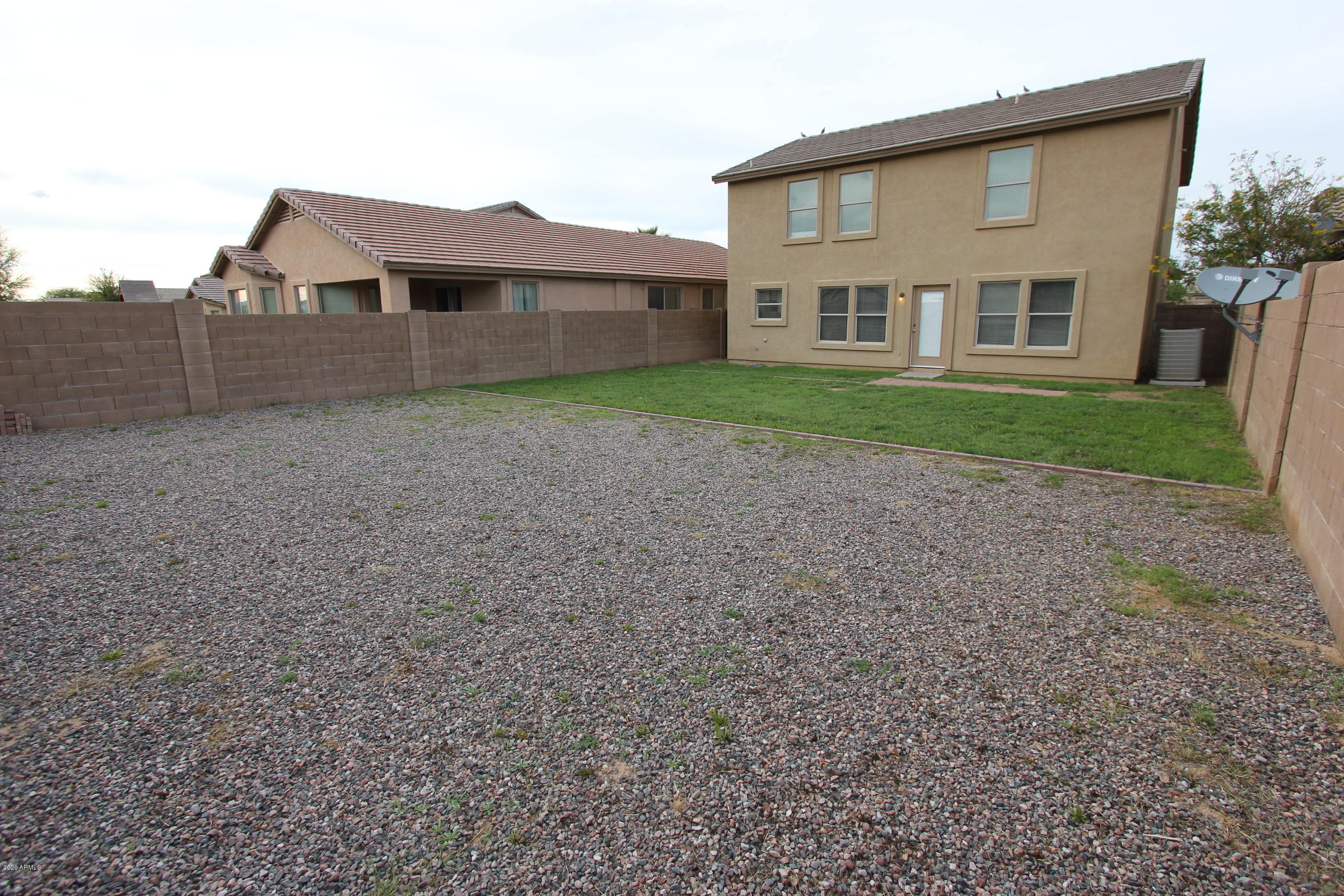 3125 West Fremont Rd. Phoenix, AZ 85041 - Photo 16 of 33 a view of a yard in front of a house