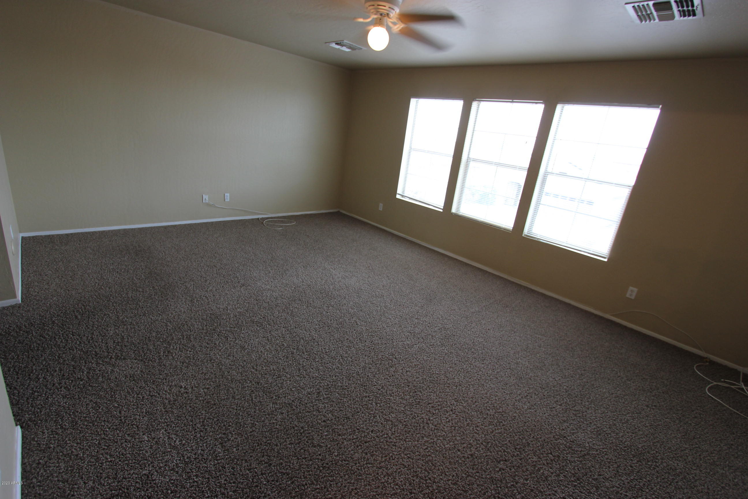 3125 West Fremont Rd. Phoenix, AZ 85041 - Photo 27 of 33 an empty room with a window