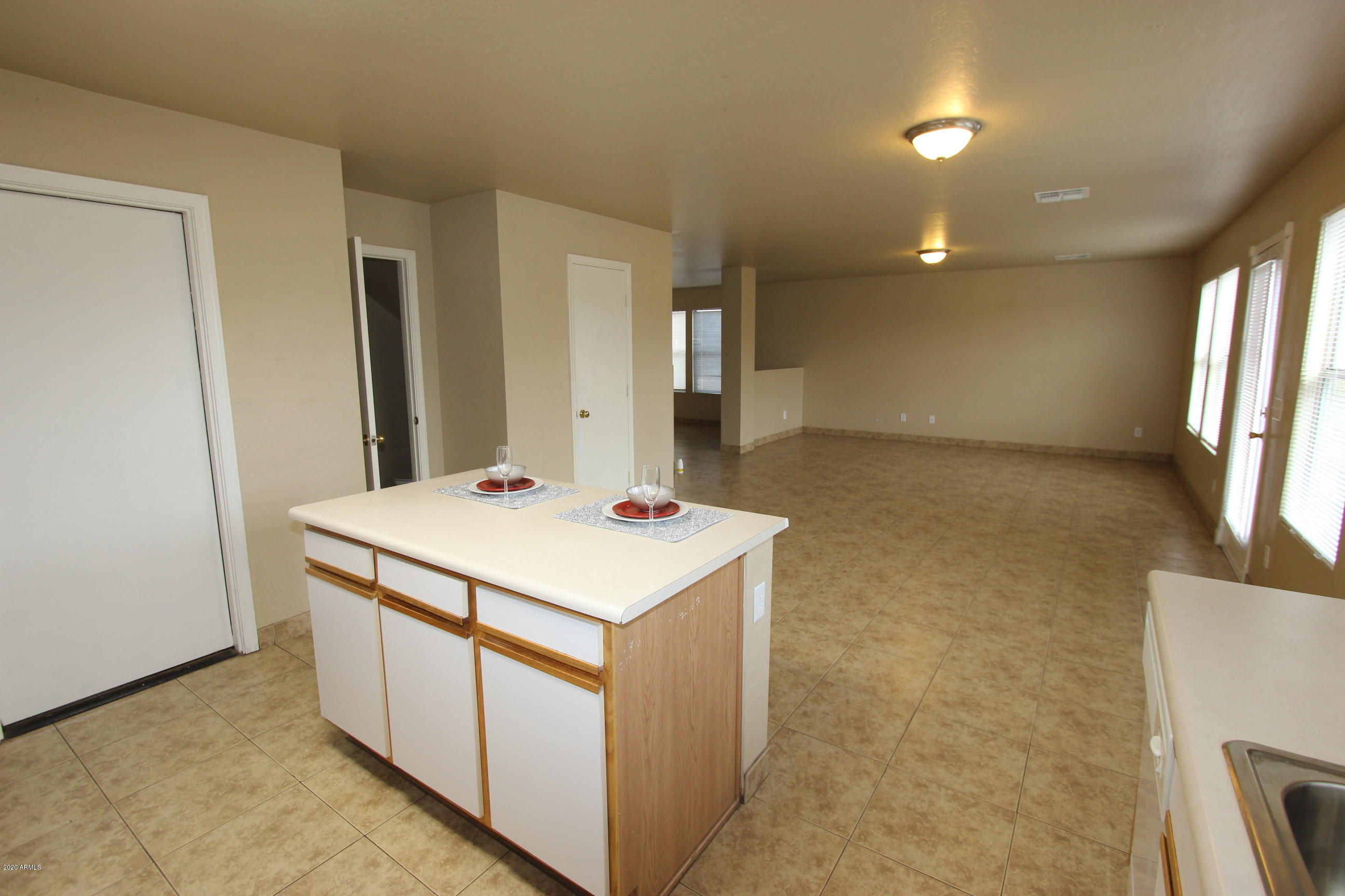3125 West Fremont Rd. Phoenix, AZ 85041 - Photo 7 of 33 a utility room with washer and dryer