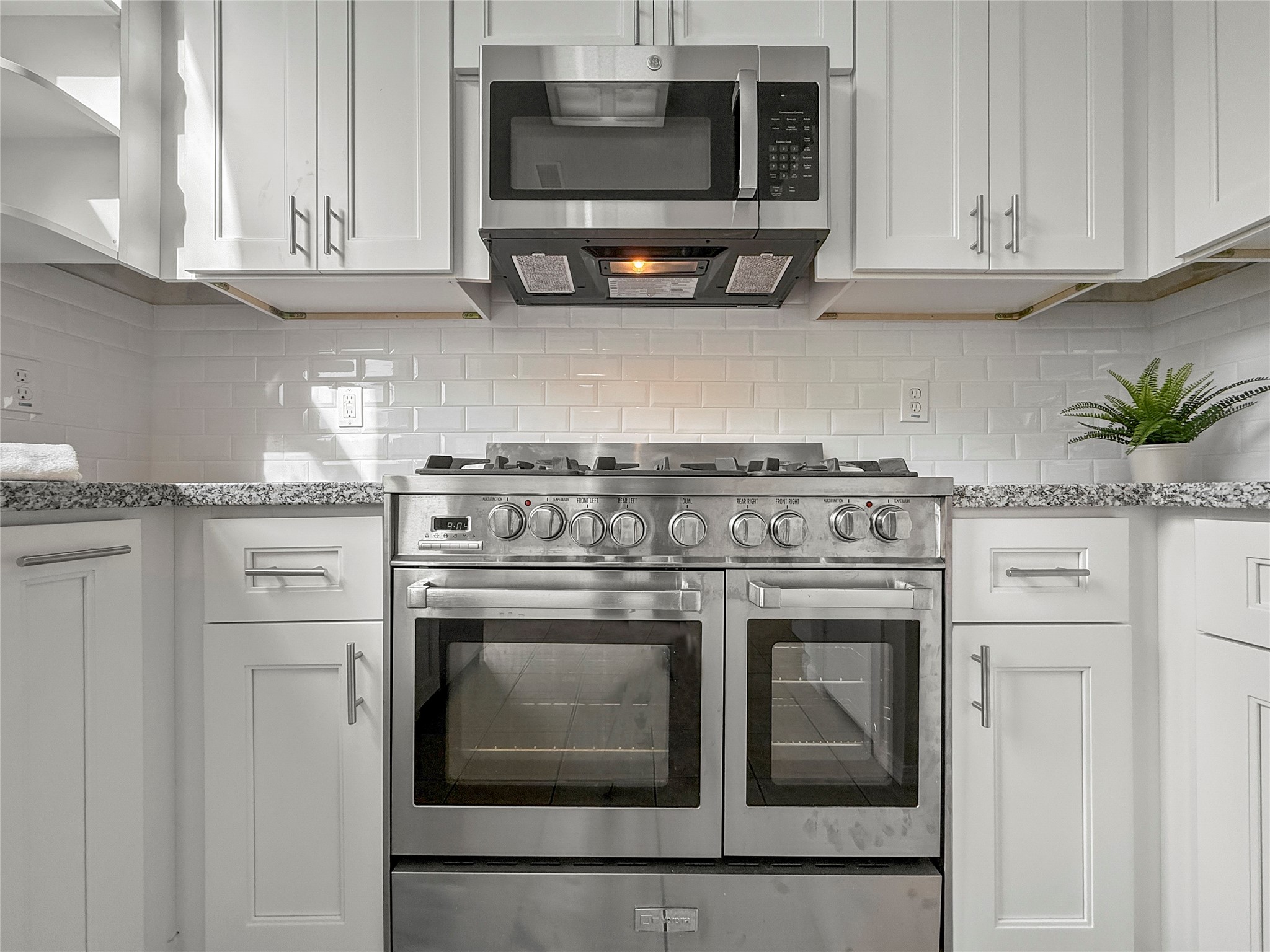 13635 Repa Lane Houston, TX 77014 - Photo 22 of 49 The stainless steel gas range with double ovens, a built-in microwave are perfect for culinary enthusiasts!