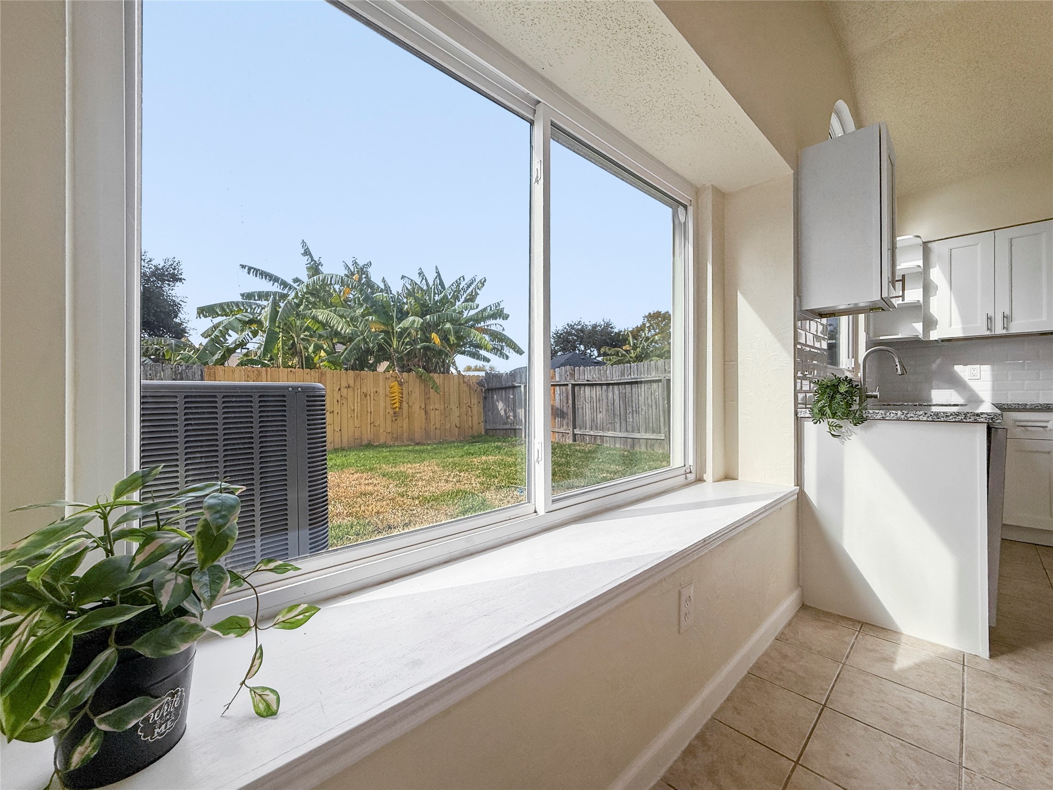 13635 Repa Lane Houston, TX 77014 - Photo 25 of 49 Do you see yourself hanging out here with the person in the kitchen to catch up when you come home?