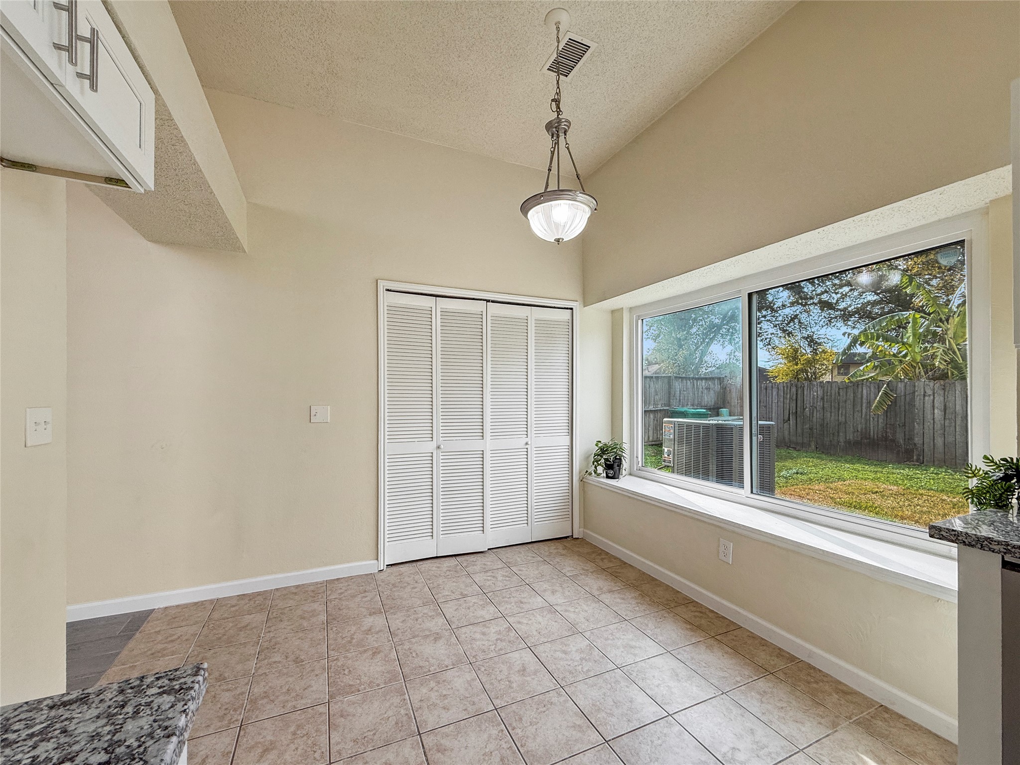 13635 Repa Lane Houston, TX 77014 - Photo 26 of 50 The breakfast area also has a large window with an extra deep windowsill that can be used for a cozy seating area as well.