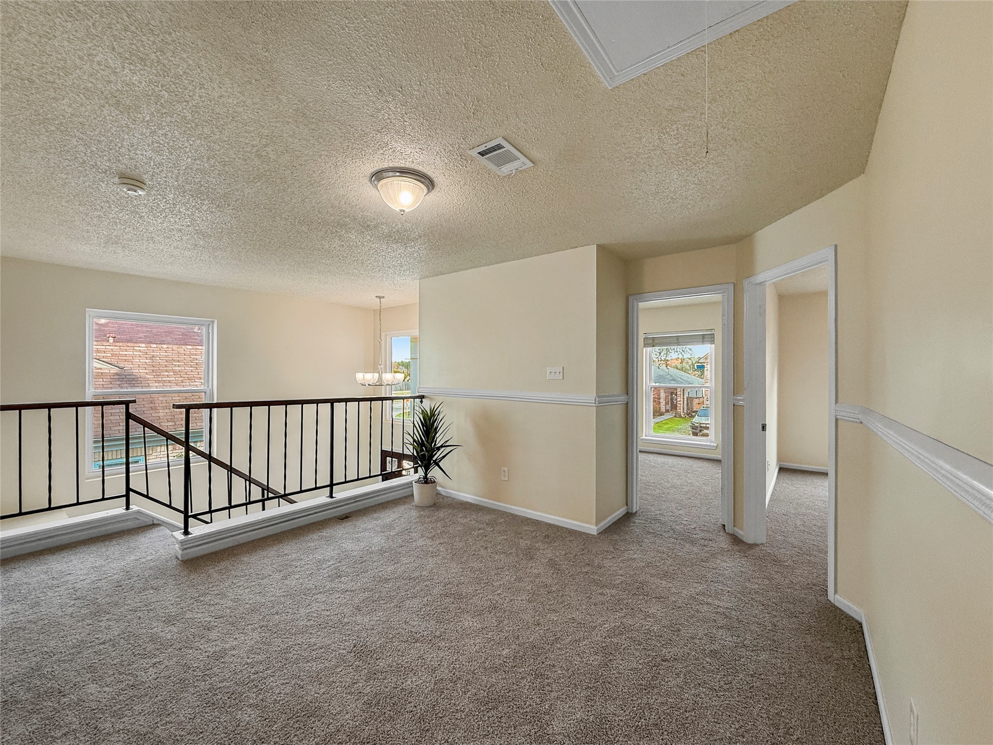 13635 Repa Lane Houston, TX 77014 - Photo 39 of 50 From the game room we also can go into the second bedroom upstairs towards the front of the home.