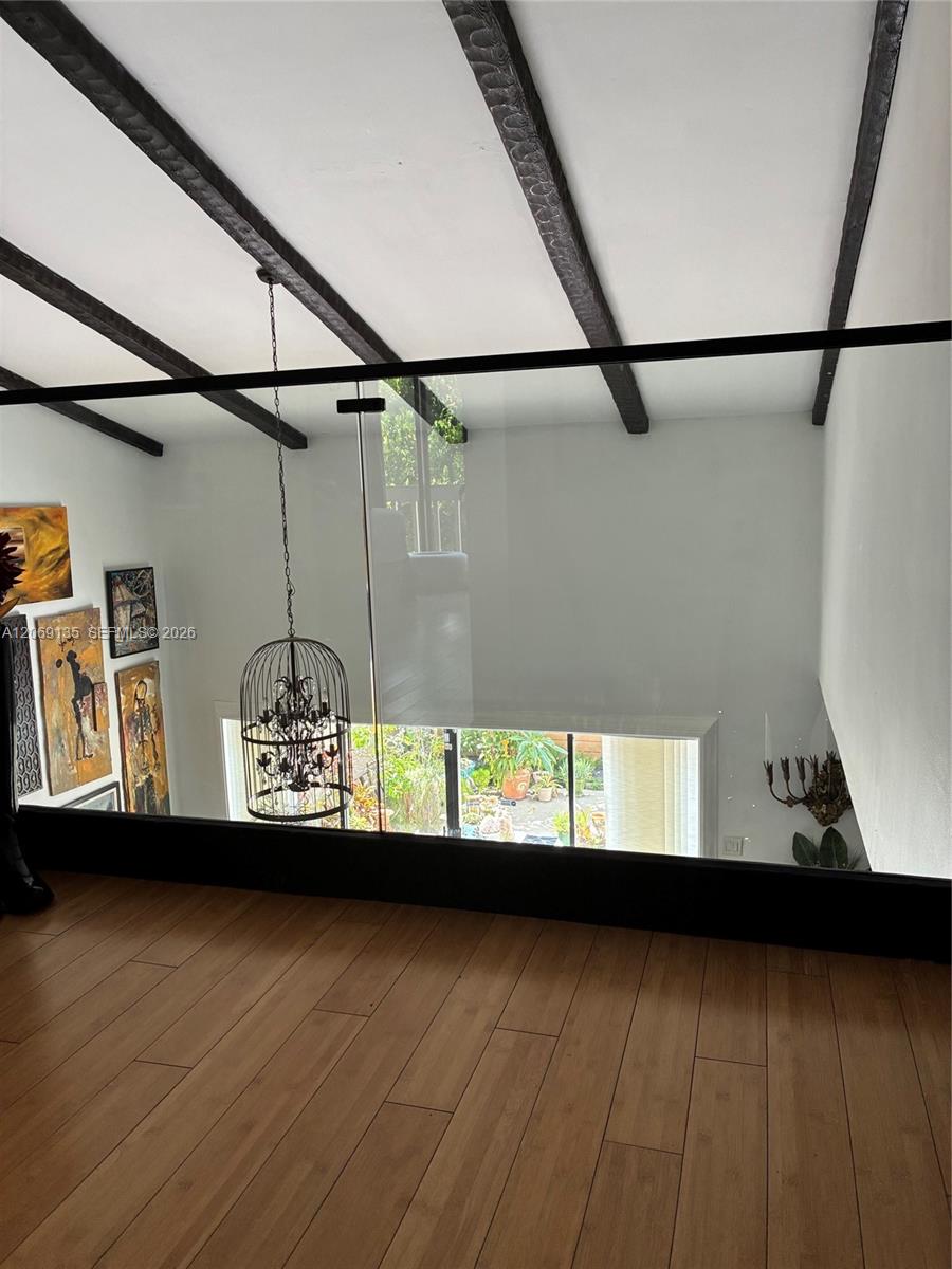 806 St Andrews Road, Unit 13 Hollywood, FL 33021 - Photo 15 of 37 Glass railing on landing