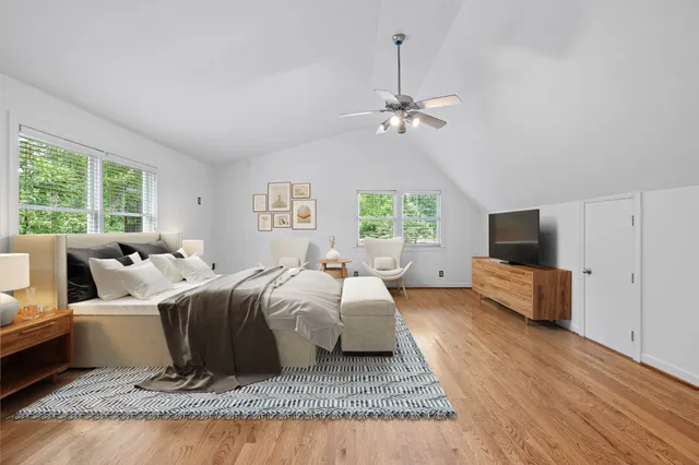 a bed room with a bed and a couch