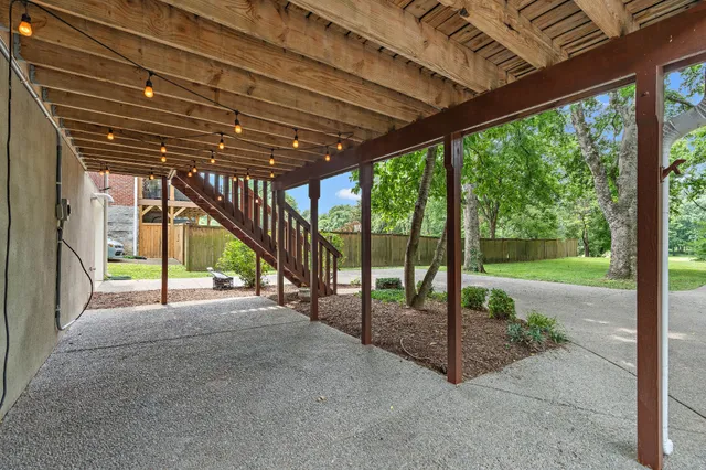 a view of outdoor space with deck and yard